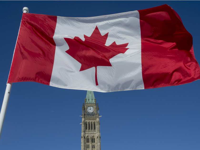 the-canadian-flag-flies-over-the-peace-tower-on-parliament-h | 989 XFM